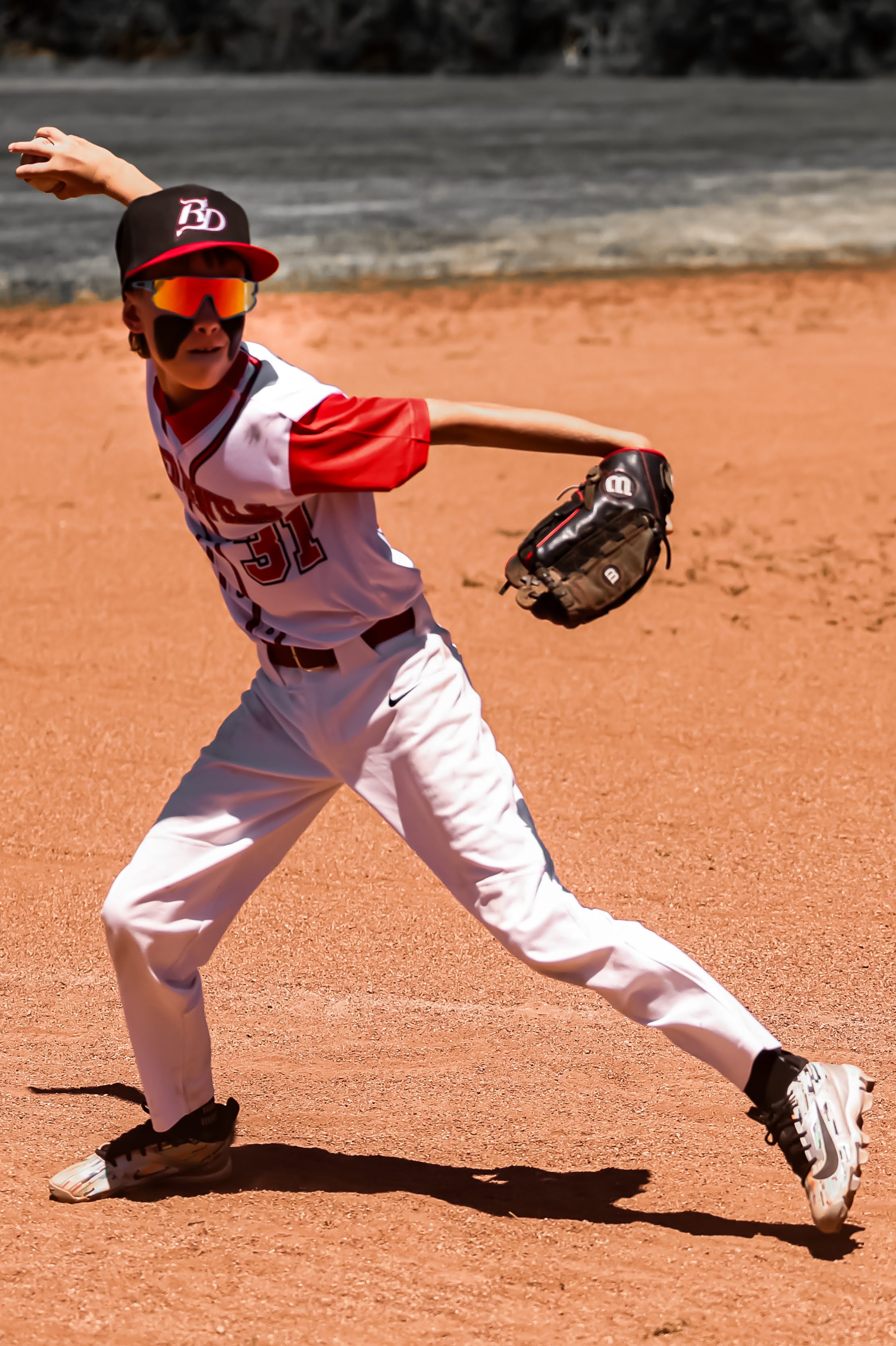 Red Devils shortstop making a throw