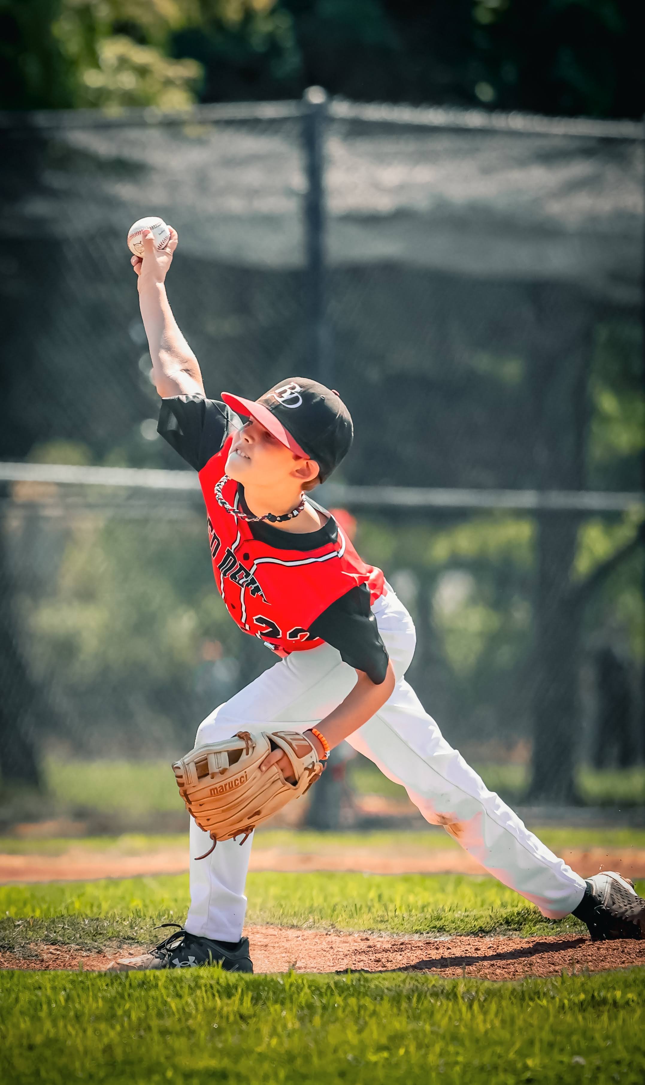 Red Devils pitcher delivering